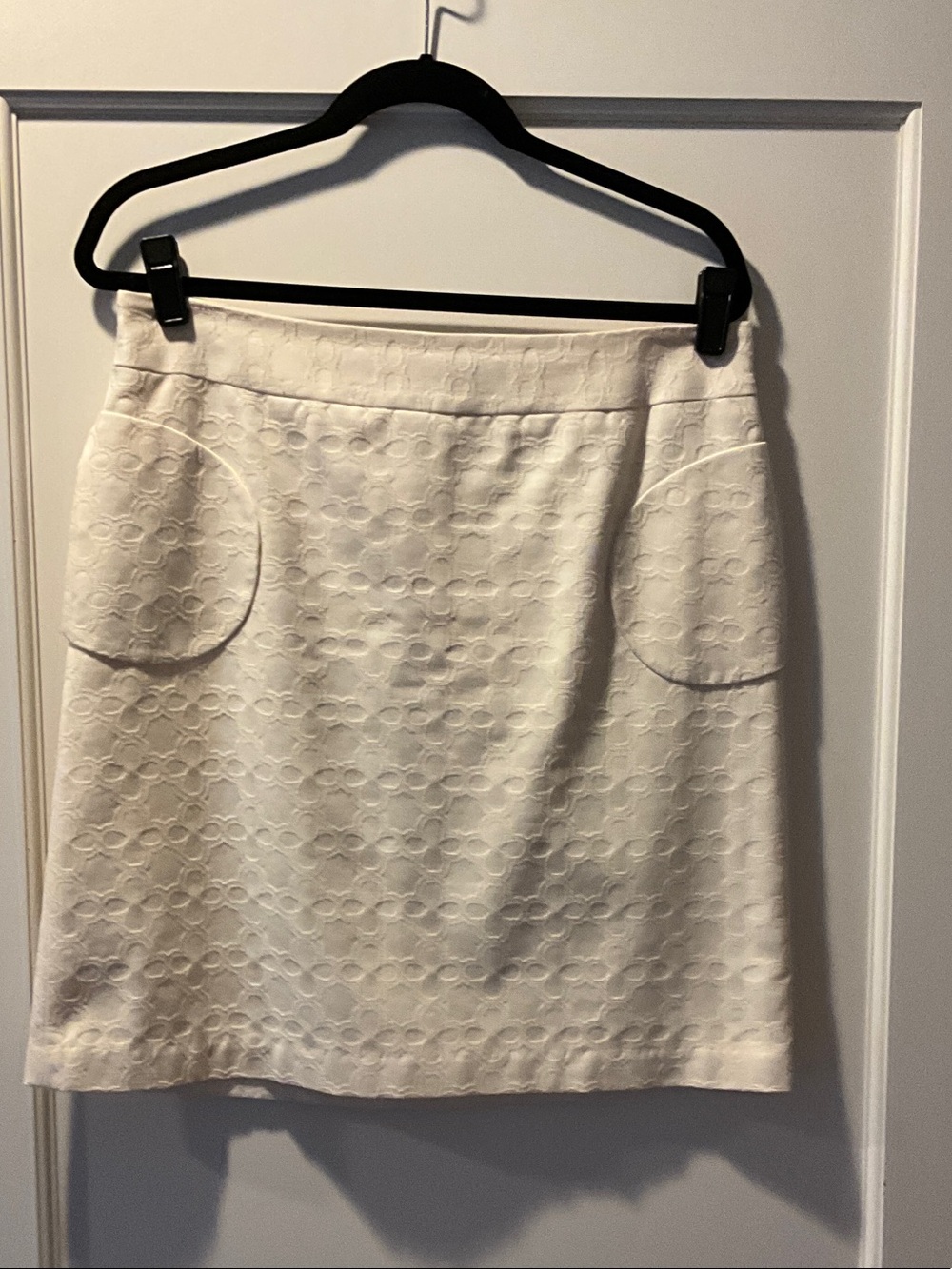 Crisp White Mini Skirt with Circular Front Pockets